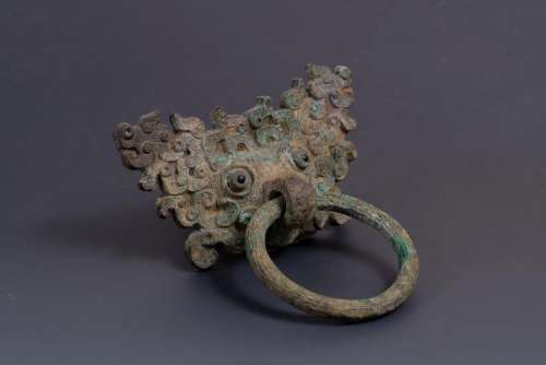 A Bronze Taotie loose ring handle, Spring and Autumn period, the head of the beast hollowed out,