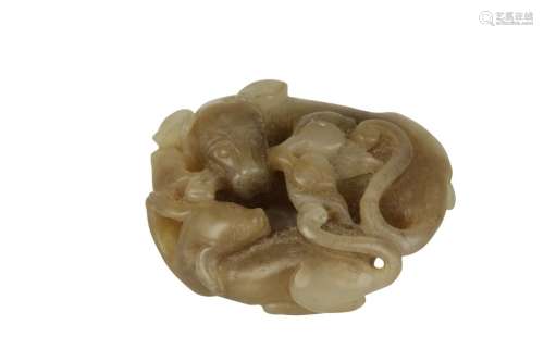 CELADON AND MOTTLED JADE 'TWO DOGS' GROUP, QING DYNASTY