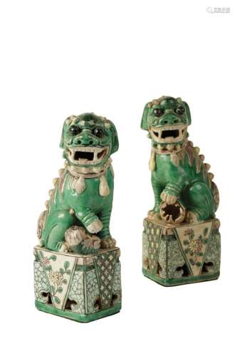 PAIR OF FAMILLE VERTE BUDDHISTIC LIONS, probably Kangxi