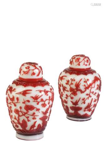 PAIR OF RUBY-RED OVERLAY WHITE GLASS 'CRAB APPLE AND PRUNUS' COVERED JARS, LATE QING DYNASTY