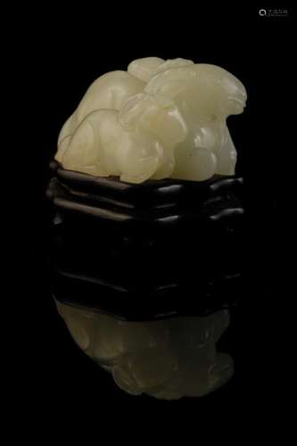 PALE CELADON JADE 'THREE RAMS' GROUP, QING DYNASTY