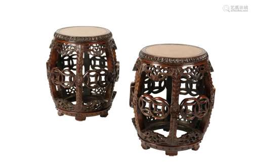 PAIR OF CARVED HUANGHUALI AND BURRWOOD BARREL STOOLS, QING DYNASTY