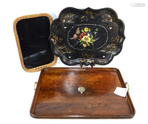 A 19th century brass handled mahogany serving tray with moulded raised lip, centred with a white