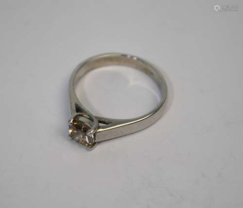 A contemporary 18ct white gold single stone ring set with circular brilliant-cut diamond in square