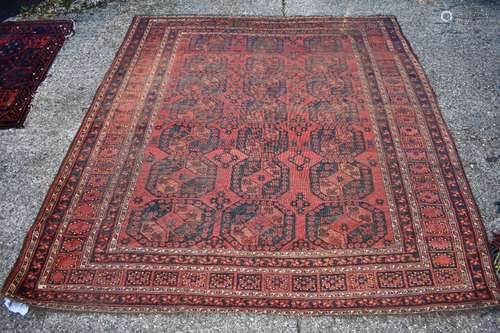 An Ersari carpet, circa 1880, the repeating geometric patterns on red ground, 275 x 243 cm [234]