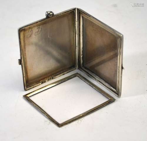 A silver double-sided rectangular photograph frame, with striped plain and engraved decoration, with