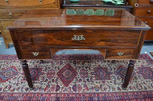 A George III crossbanded mahogany bureau, with well fitted shaped interior over four long