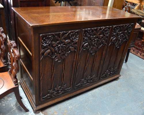 A substantial late 19th century oak coffer, the jointed frame with cleated and hinged top over