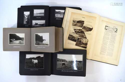 Four early 20th century photograph albums compiled by Baines containing topographical photos of