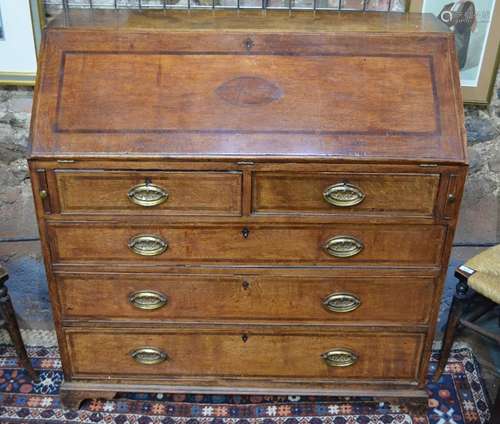 A George III rosewood cross-banded oak bureau, the fall centred by an inlaid shell motif enclosing