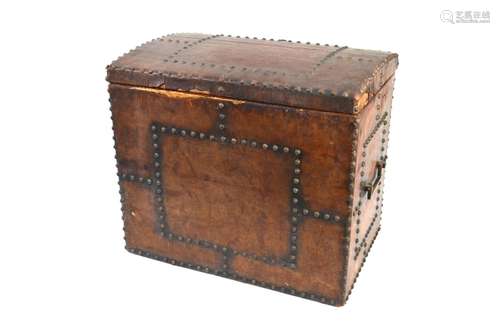 A 19th century studded leather covered box with handles to sides, the inner with removable tin