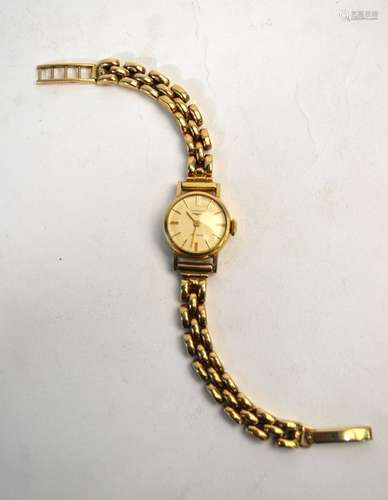 A lady's 9ct gold Longines wristwatch with automatic movement, on gatelink bracelet strap, 23 g