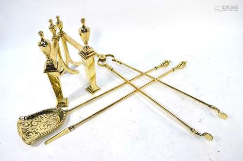 A trio of Victorian style brass fire tools, to/w a pair of brass fire dogs