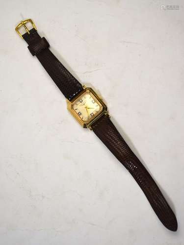 A Longines 14k wristwatch in the Art Deco manner, the square dial set with four diamonds at the