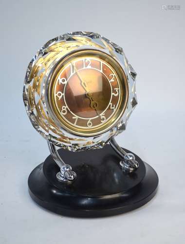 Majak, USSR, a retro mantel clock, the circular gilt drum and movement encased in a multi-facetted