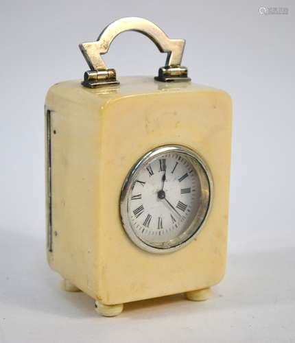 A silver-mounted ivory boudoir clock with French movement, London 1911, 9.5 cm high