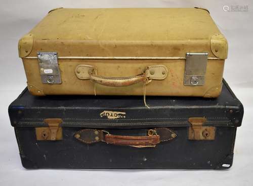 A cream vellum Globetrotter suitcase and a larger blue vintage suitcase (2)