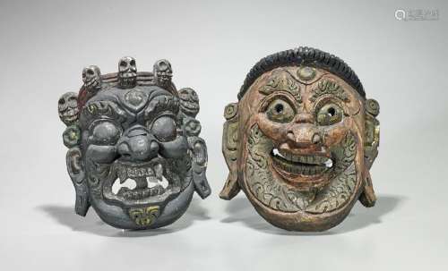 Two Nepalese Carved & Polychrome Wood Masks