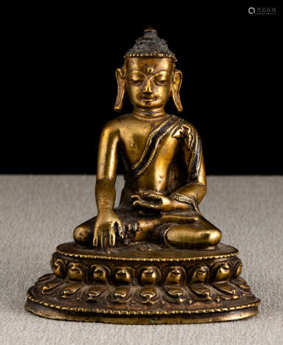 A COPPER-INLAID BRONZE FIGURE OF BUDDHA SHAKYAMUNI