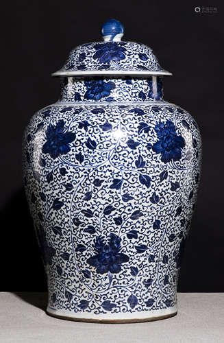 A LARGE BLUE AND WHITE VASE AND COVER