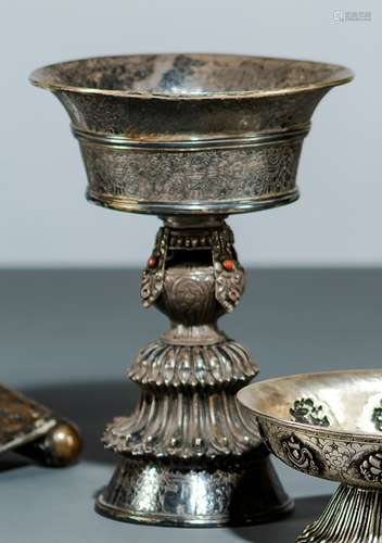 A SILVER BUTTER LAMP