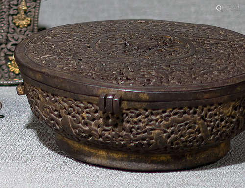 A WROUGHT IRON ALMS-BOWL CONTAINER