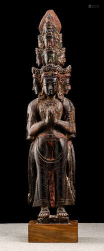 A POLYCHROME HARDWOOD FIGURE OF EKADASHALOKESHVARA