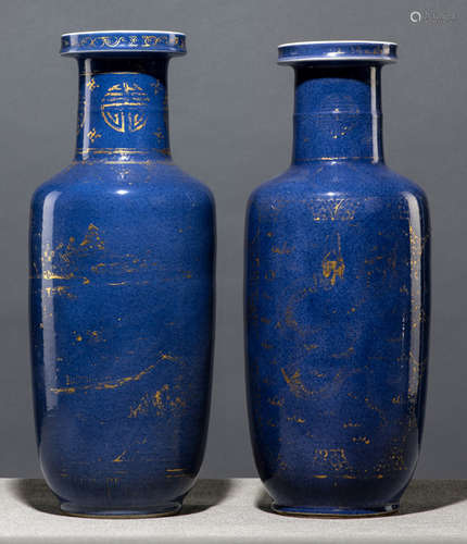 TWO POWEDERBLUE-GROUND GILT PAINTED PORCELAIN ROULEAU VASES