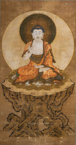 Teaching Buddha Shakyamuni Sitting on a Rock