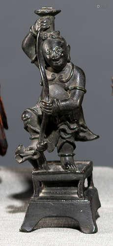 A BRONZE FIGURE OF A BOY AS INK STICK HOLDER