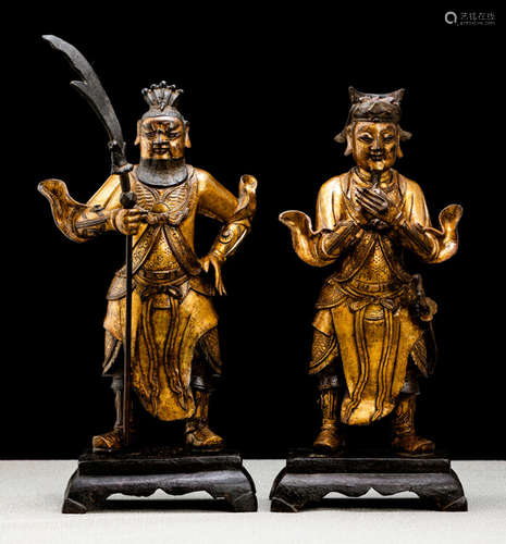 A PAIR OF GILT-BRONZE GUARDIANS