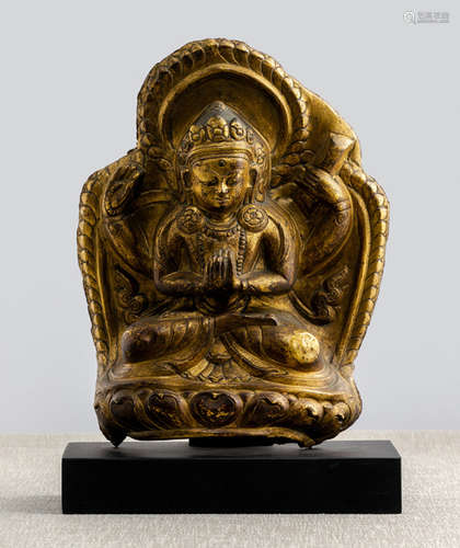 A GILT-COPPER EMBOSSED PLAQUE DEPICTING MANJUSHRI