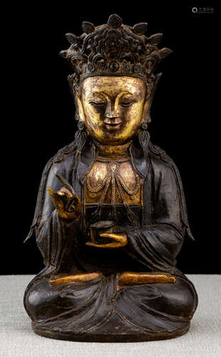 A PARCEL GILT-BRONZE FIGURE OF GUANYIN