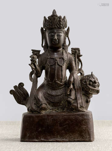 A BRONZE FIGURE OF MANJUSHRI