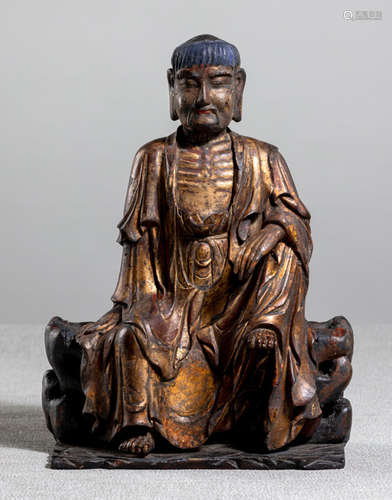 A POLYCHROME WOOD FIGURE OF THE EMACIATED BUDDHA SHAKYAMUNI