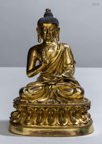 A FINE GILT-BRONZE FIGURE OF BUDDHA SHAKYAMUNI