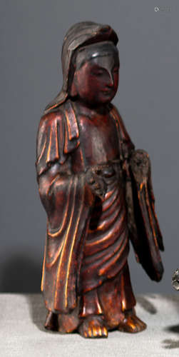 A GILT-LACQUERED WOOD FIGURE OF STANDING GUANYIN