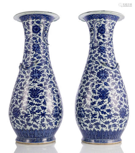 A LARGE PAIR OF BLUE AND WHITE LOTOS AND FLOWER VASES WITH CHILONG IN RELIEF