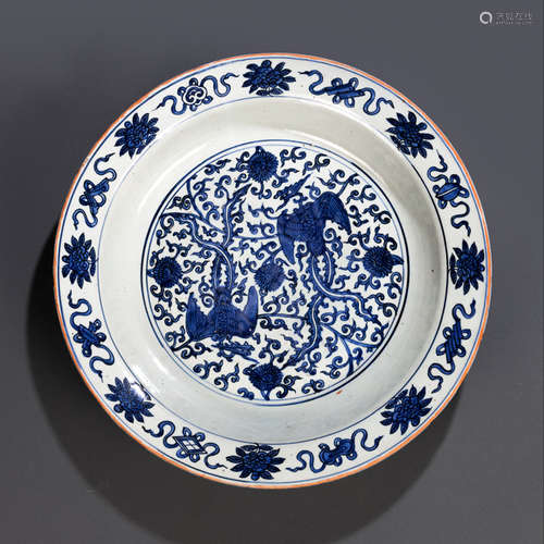 A LARGE BLUE AND WHITE PHOENIX PLATE