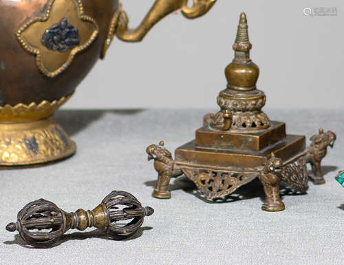 A BRONZE STUPA AND A BRONZE VAJRA