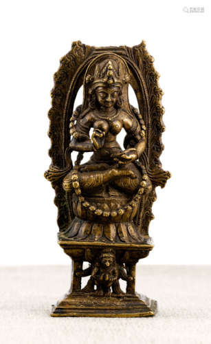 A BRONZE FIGURE OF THE FEMALE DEITY NA GA RAJA