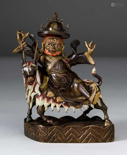 A POLYCHROME BRONZE FIGURE OF  DORJE LEGPA AS GARWA NAGPO