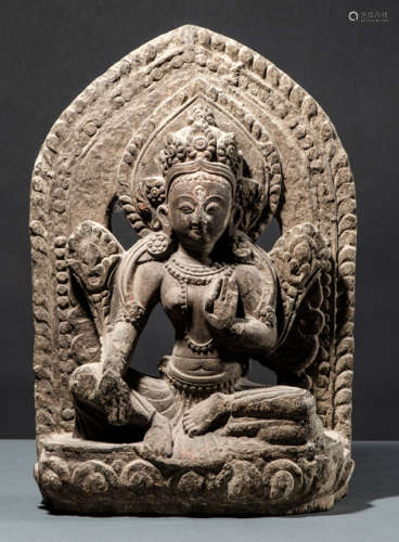 A STONE FIGURE OF A TARA