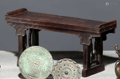 A MINIATURE WOODEN ALTAR TABLE