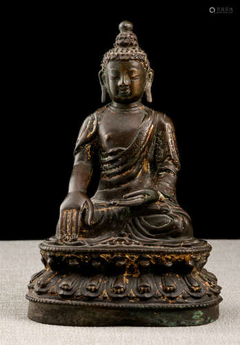 A BRONZE FIGURE OF BUDDHA SHAKYAMUNI