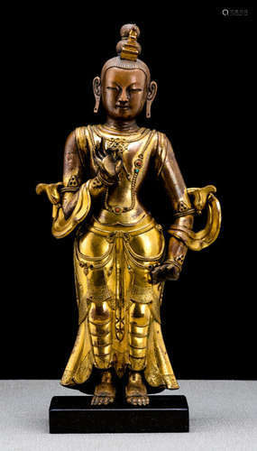 A PARCEL GILT-BRONZE FIGURE OF MAITREYA