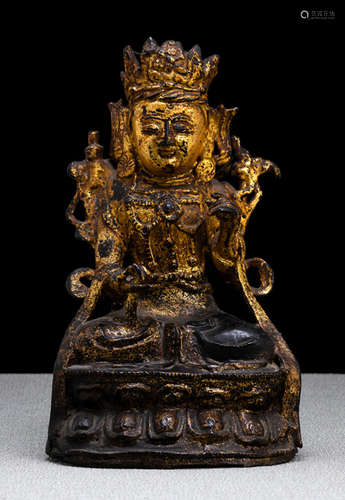 A GILT-LACQUERED BRONZE FIGURE OF GUANYIN