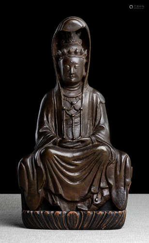 A BRONZE MODEL OF SEATED GUANYIN