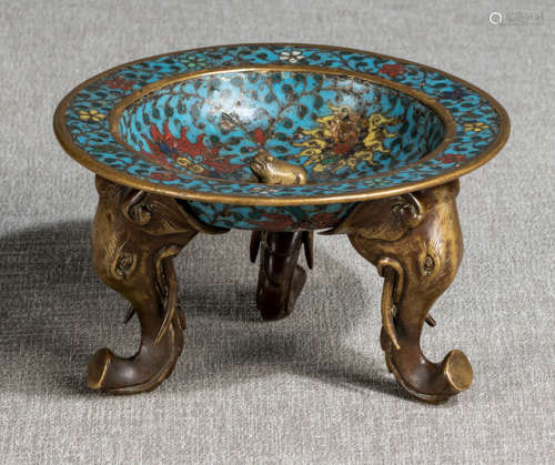 A CLOISONNÉ-ENAMEL BOWL ON THREE ELEPHANT LEGS WITH A FROG INSIDE