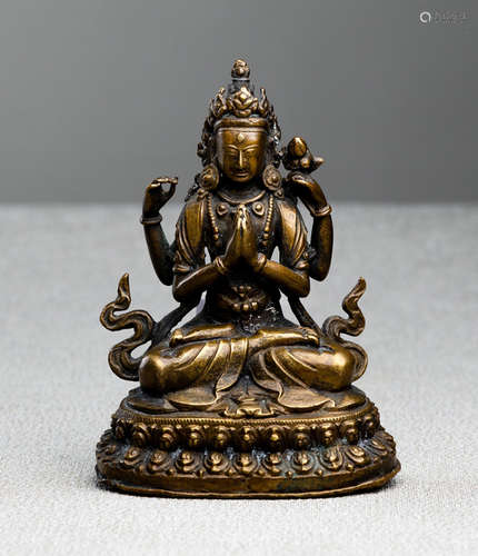 A BRONZE FIGURE OF SADAKSHARILOKESHVARA